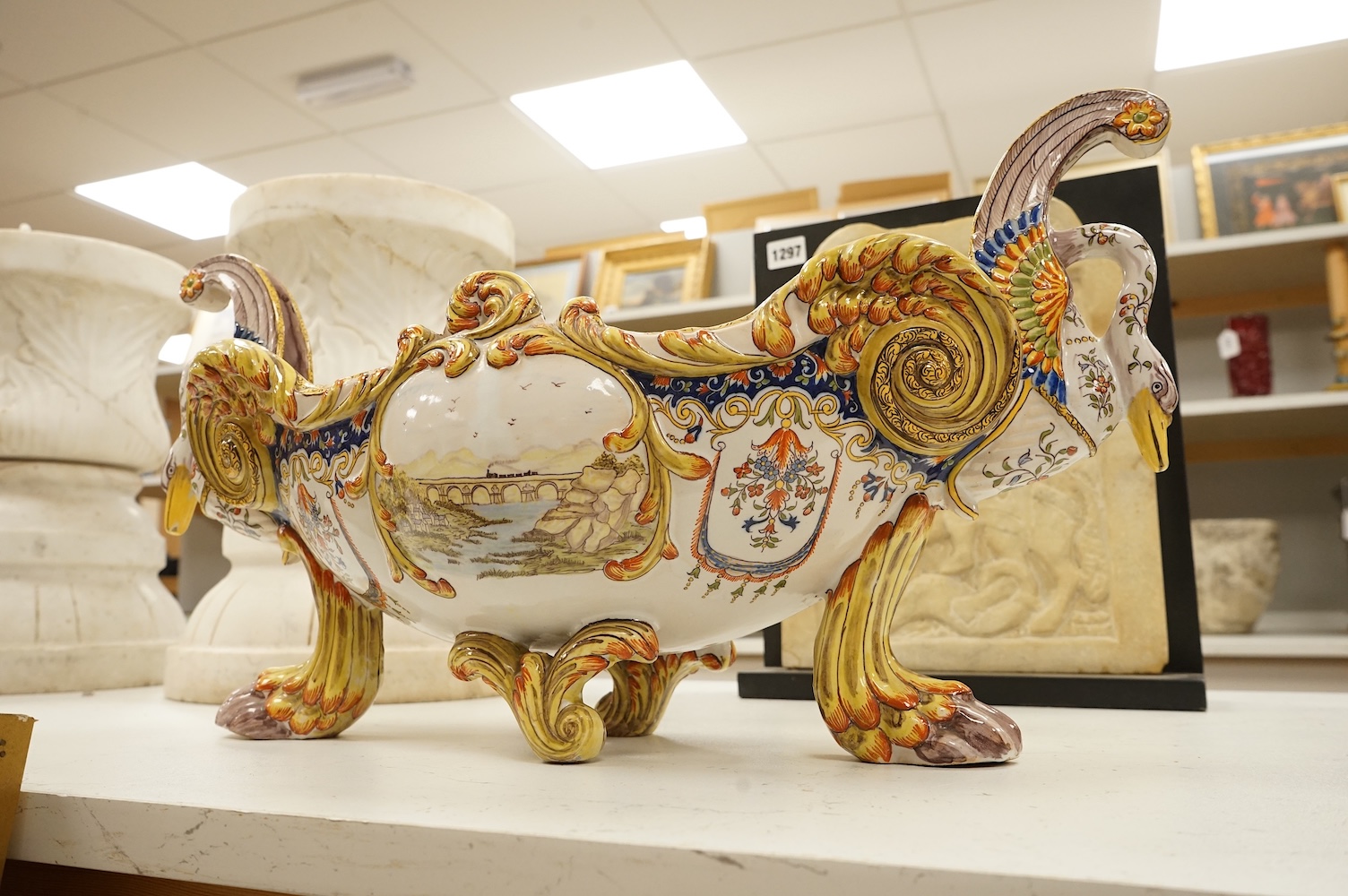 An early 20th century French faience jardiniere, 55cm wide